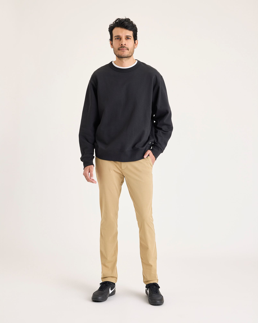 Front view of model wearing Harvest Gold Go Activeflex Chino, Skinny Fit.