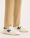 View of model wearing Harvest Gold Go Activeflex Chino, Slim Fit.