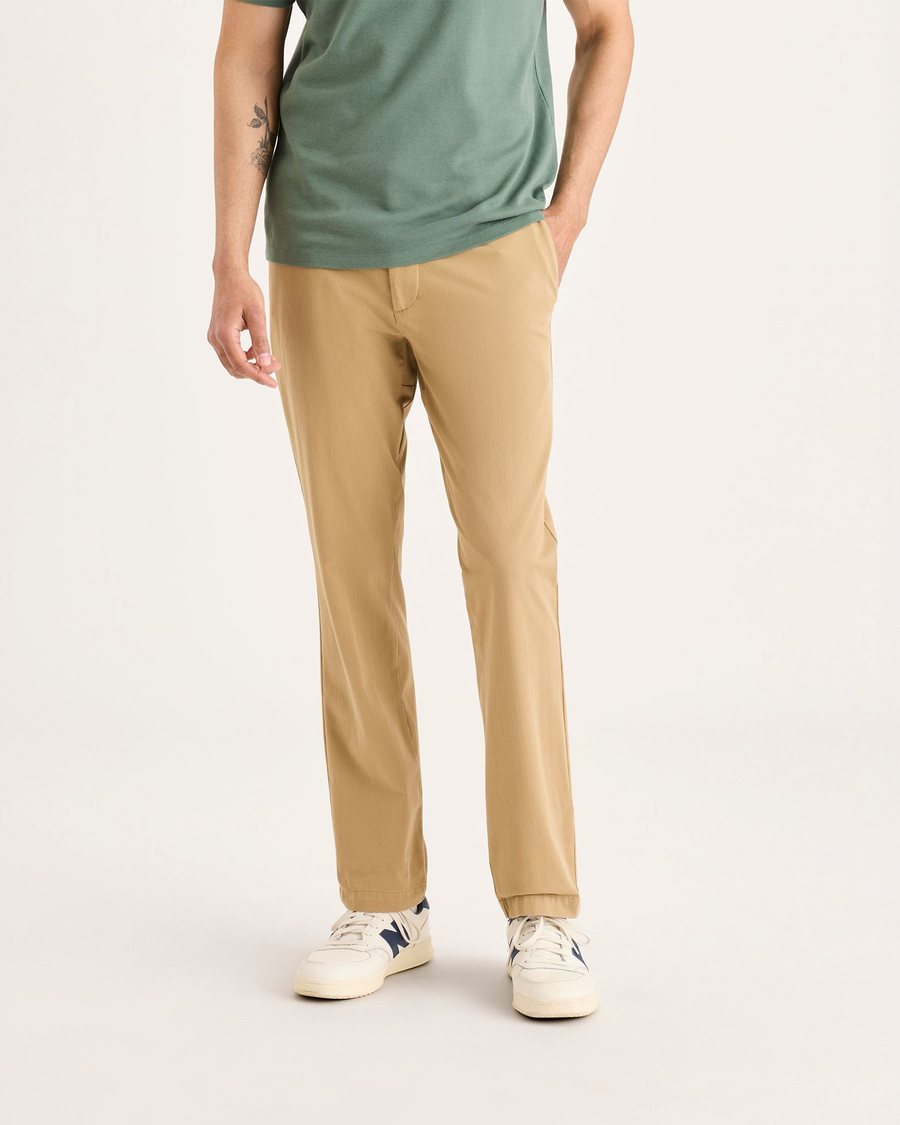 Front view of model wearing Harvest Gold Go Activeflex Chino, Slim Fit.