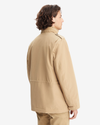 Back view of model wearing Harvest Gold Men's Field Jacket.