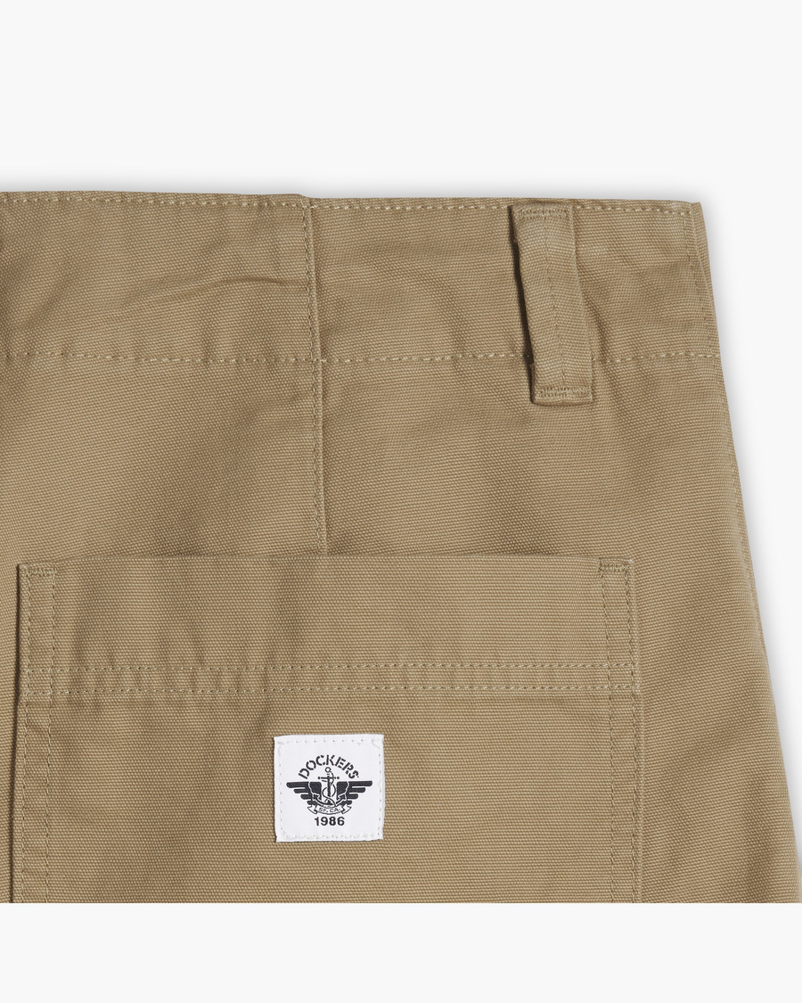 View of model wearing Harvest Gold Men's Loose Fit Eighty-Six Dock 10" Shorts.