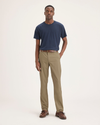 Front view of model wearing Harvest Gold Men's Slim Fit Smart 360 Flex Ultimate Chino Pants.