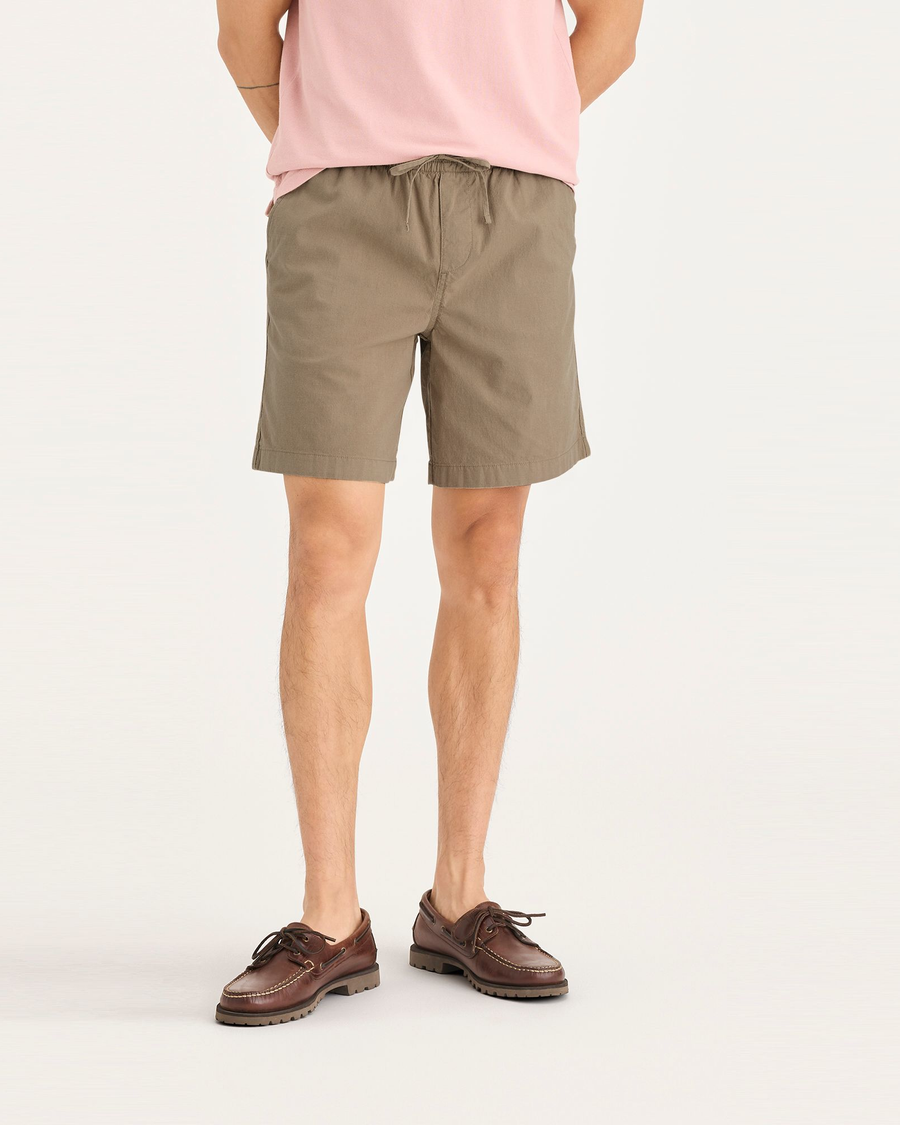 Front view of model wearing Harvest Gold Men's Straight Fit Ultimate Pull-On Short.