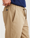 View of model wearing Harvest Gold Men's Straight Tapered Fit California Pull-On Pants.