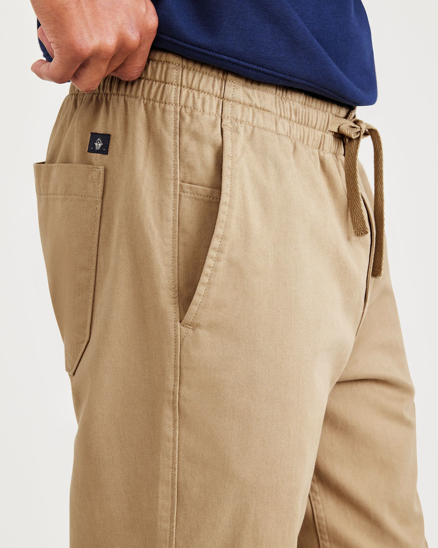 View of model wearing Harvest Gold Men's Straight Tapered Fit California Pull-On Pants.