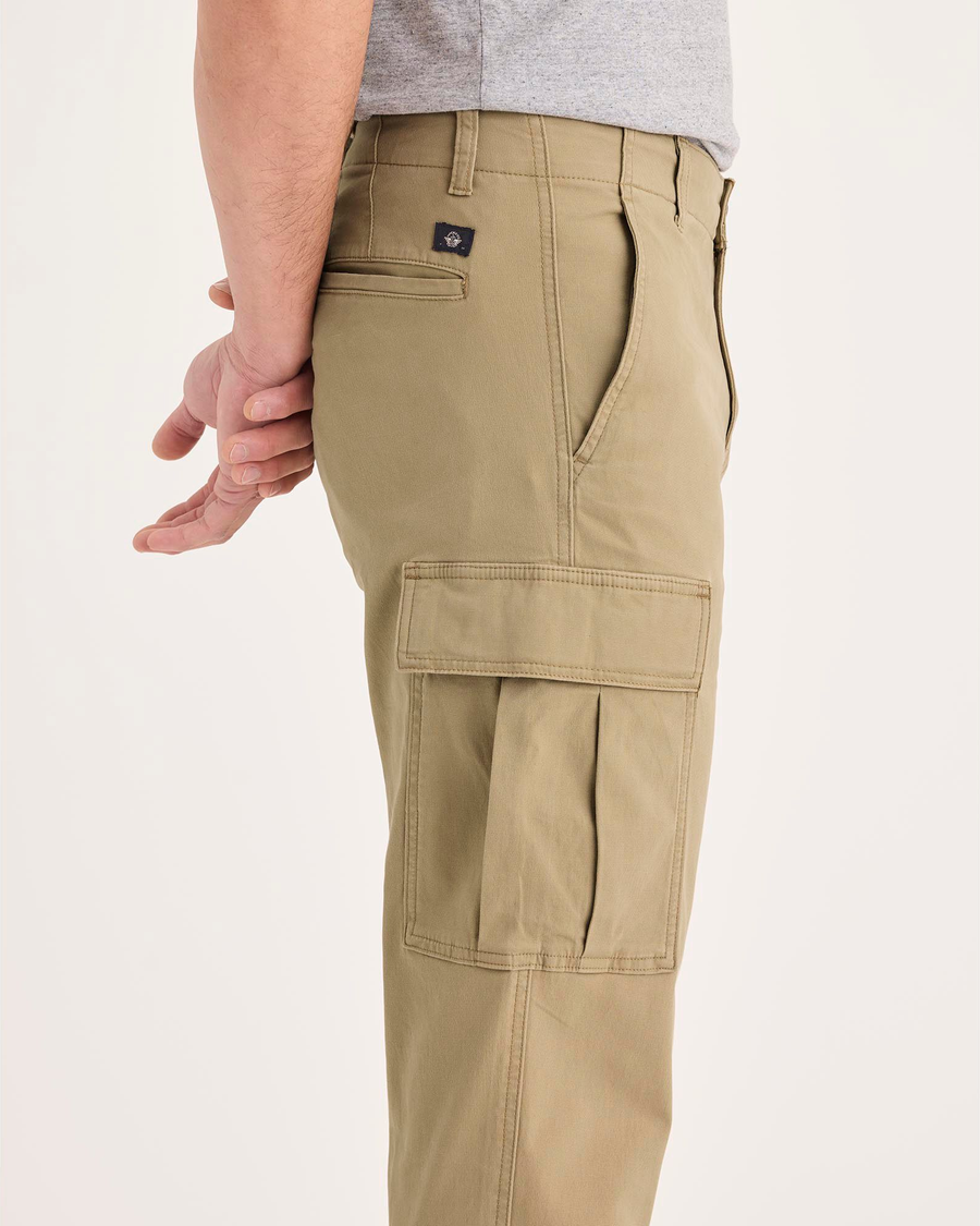 Side view of model wearing Harvest Gold Utility Cargo Pant, Straight Fit.