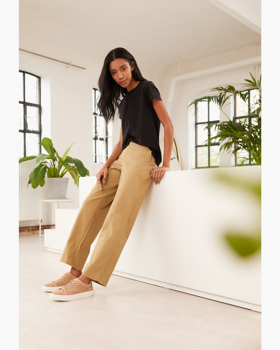 Front view of model wearing Harvest Gold Women's High Waisted Straight Fit Original Khaki Pants.