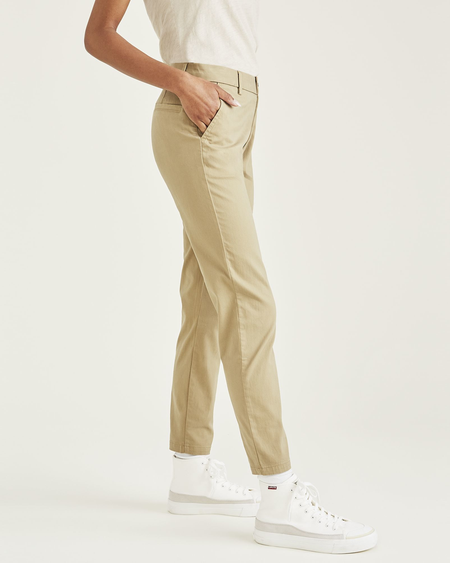 Side view of model wearing Harvest Gold Women's Skinny Fit Chino Pants.