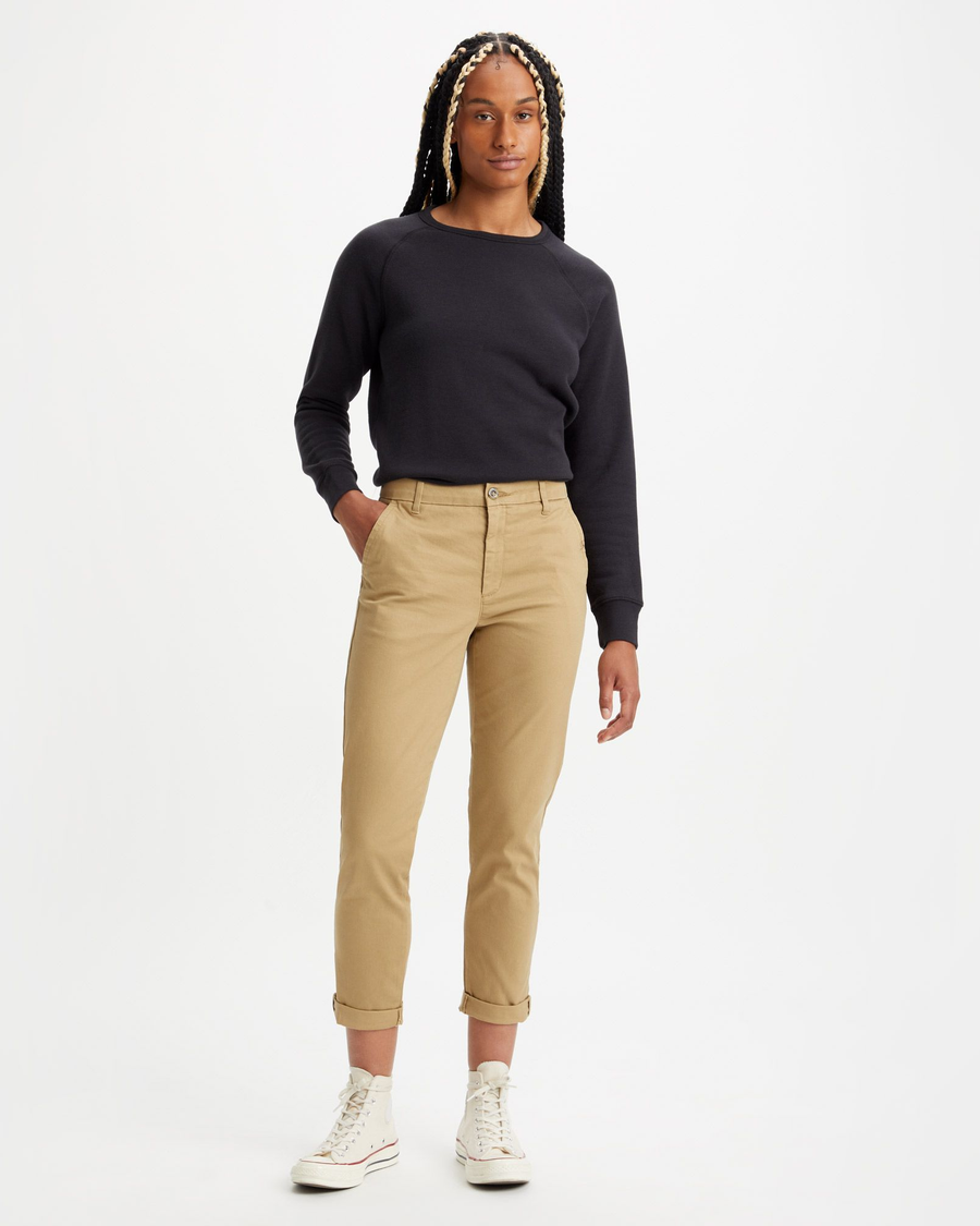 Front view of model wearing Harvest Gold Women's Slim Fit Weekend Chino Pants.