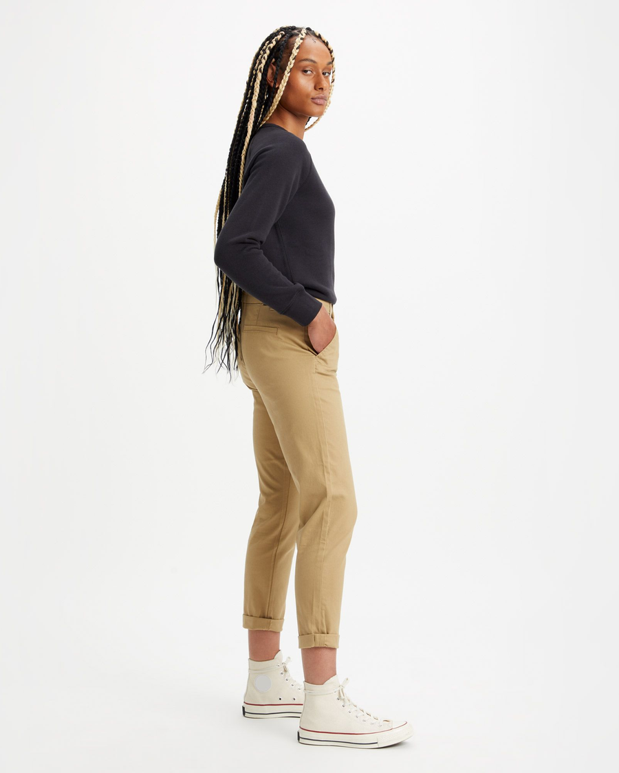 Side view of model wearing Harvest Gold Women's Slim Fit Weekend Chino Pants.