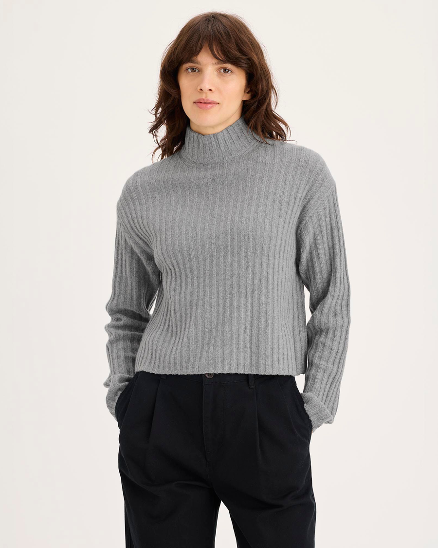 Front view of model wearing Heather Gray Mockneck Sweater, Relaxed Fit.