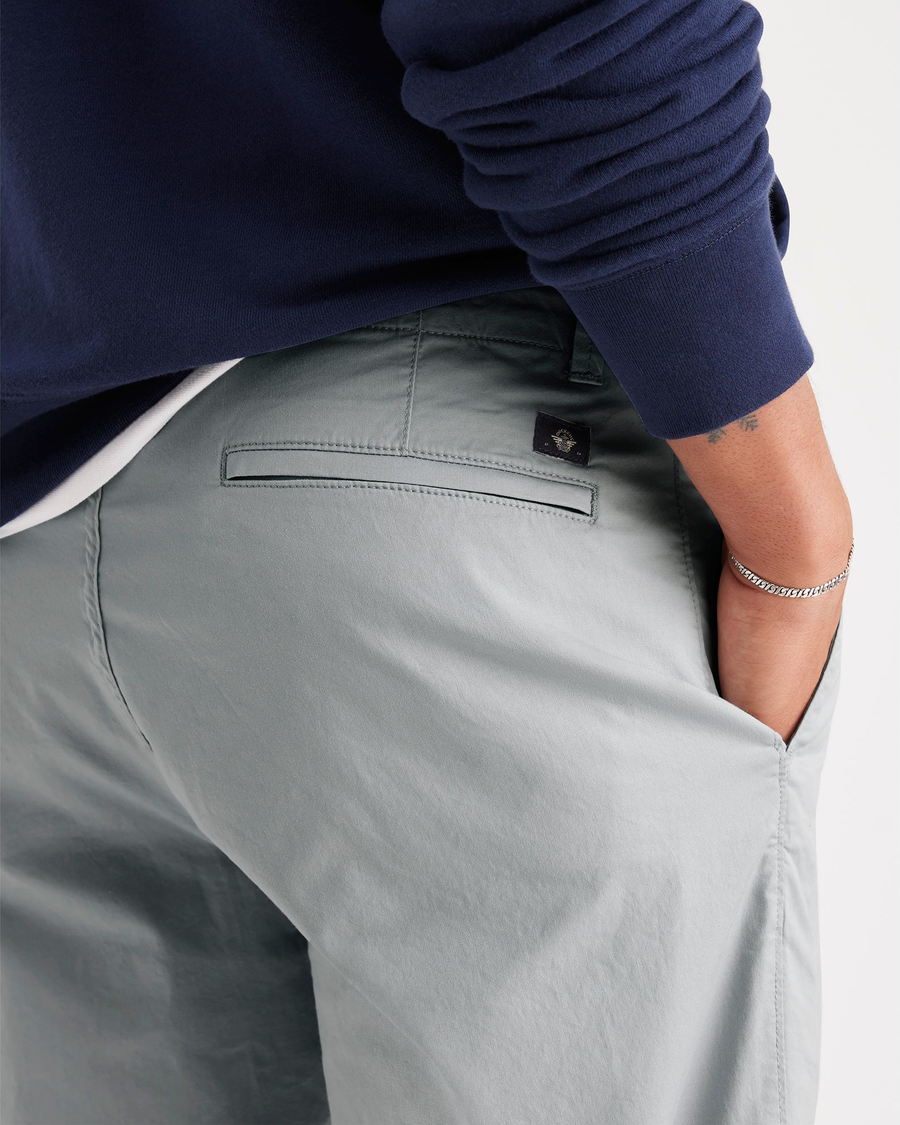 View of model wearing High-Rise Alpha Chino Shorts, Straight Fit.