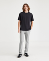 Front view of model wearing High-Rise Men's Slim Fit Smart 360 Flex California Chino Pants.