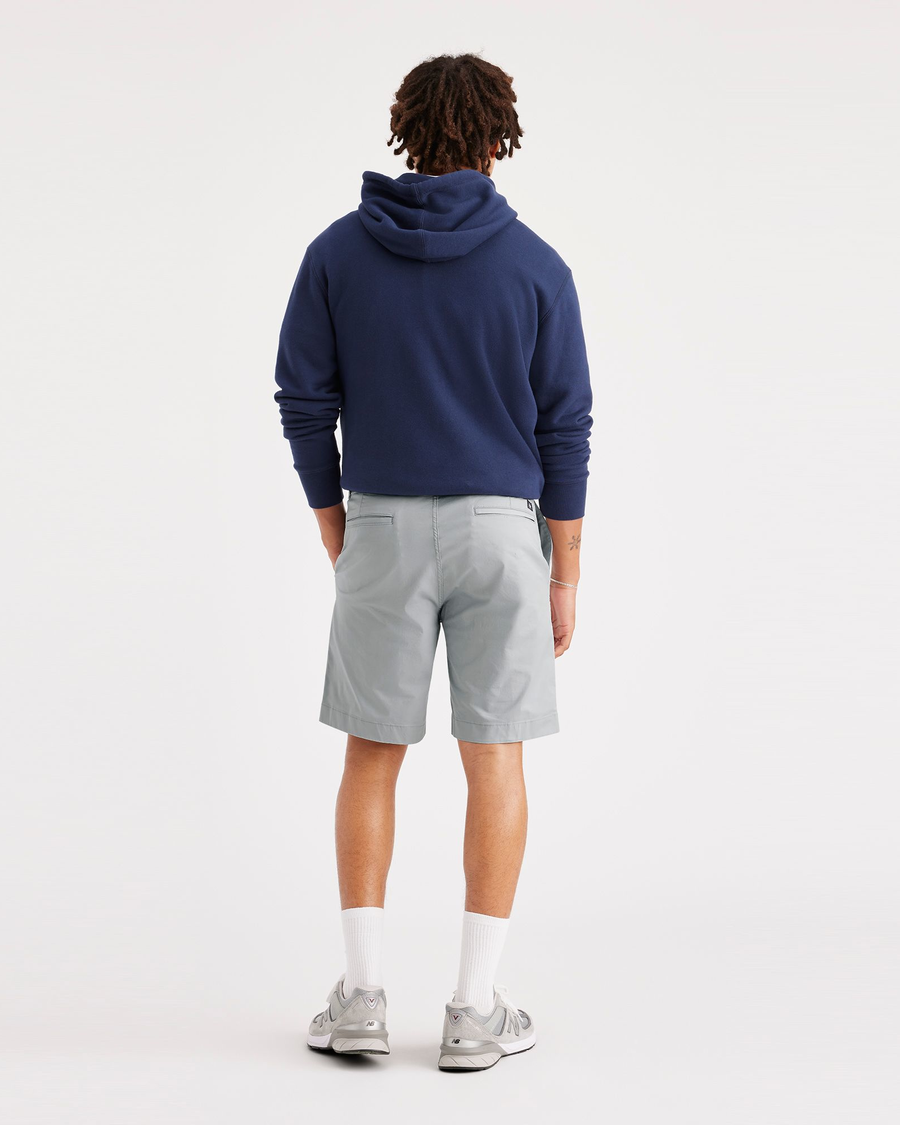 Back view of model wearing High-Rise Men's Straight Fit California Shorts.