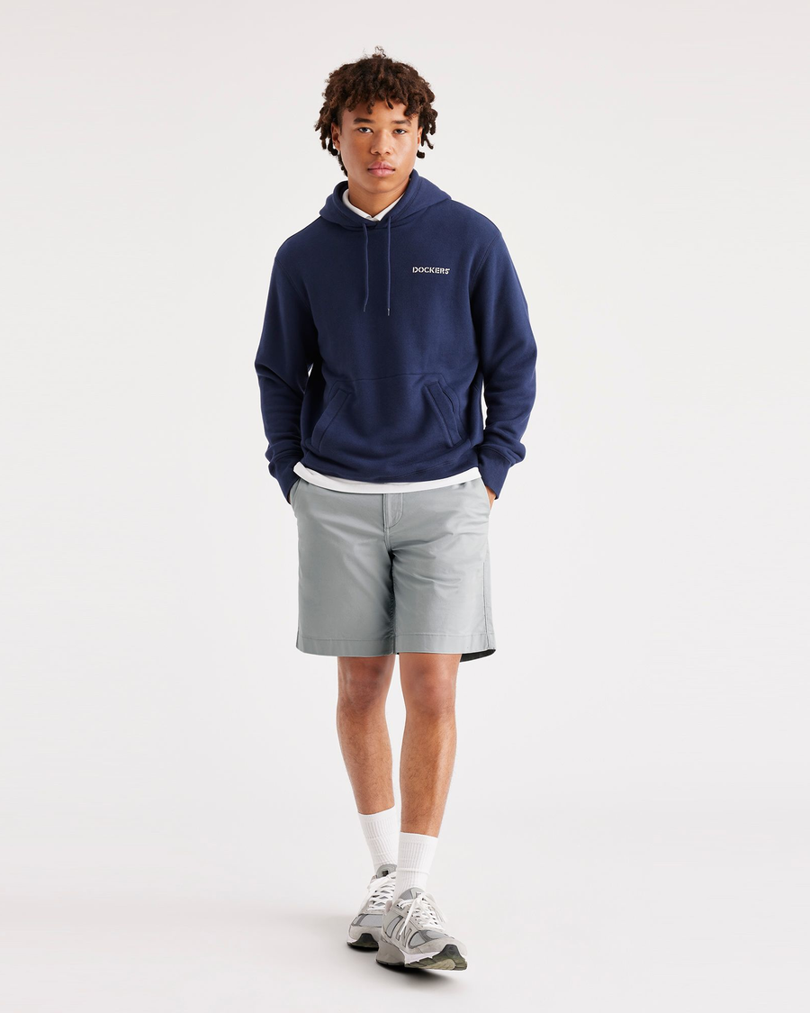 Front view of model wearing High-Rise Men's Straight Fit California Shorts.