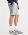 Side view of model wearing High-Rise Men's Straight Fit California Shorts.