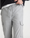 View of model wearing High-Rise Men's Straight Tapered Fit Cargo Jogger Pants.