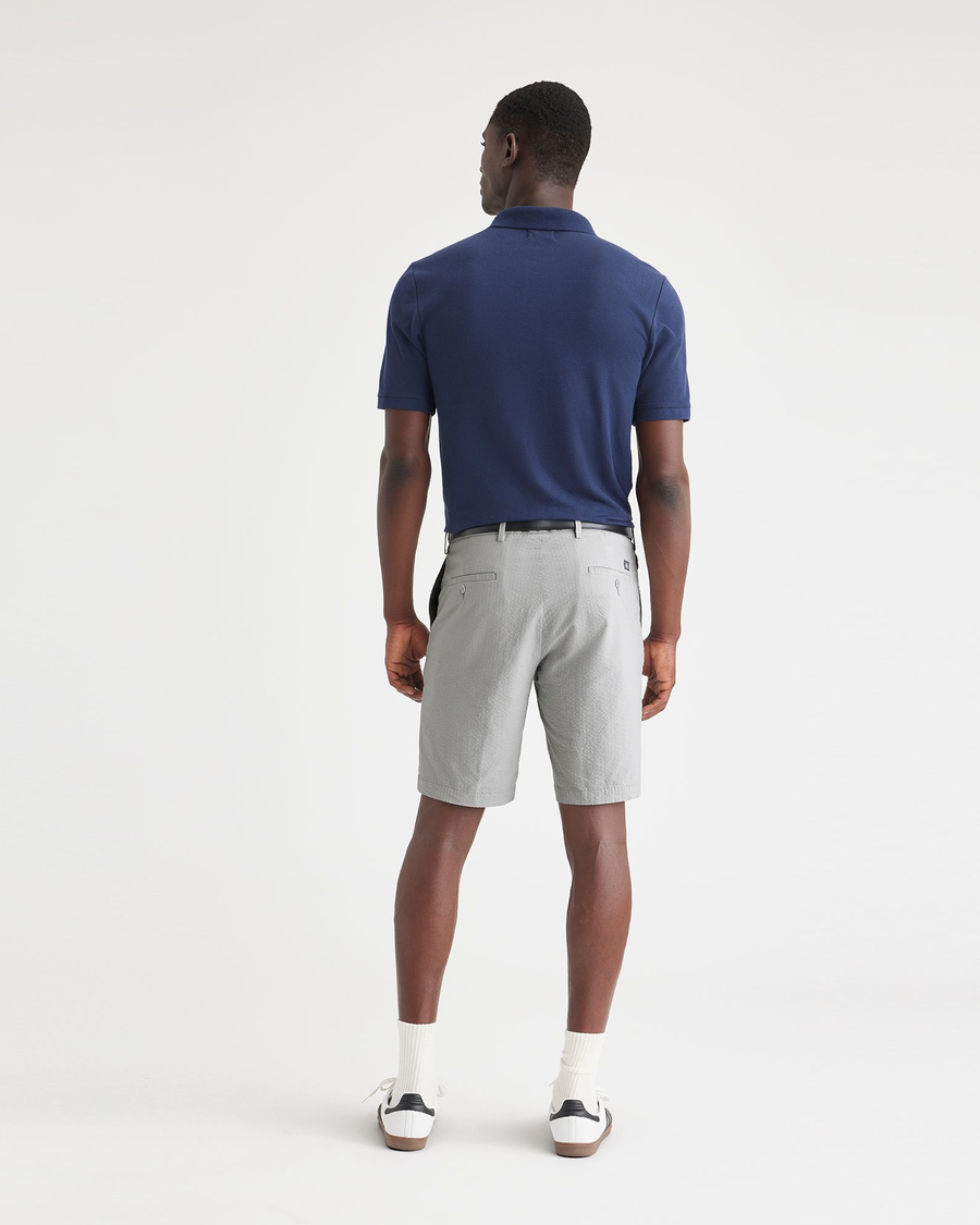 Back view of model wearing High-Rise Men's Supreme Flex Modern Chino Short.