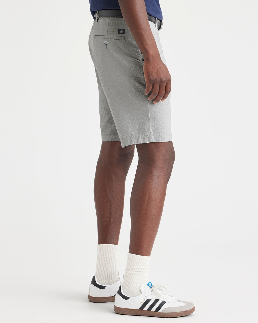 Side view of model wearing High-Rise Men's Supreme Flex Modern Chino Short.