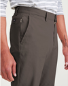 View of model wearing Khaki Green Men's Slim Fit Smart 360 Flex Alpha Chino Pants.