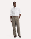 View of model wearing Lemon Pepper Eighty-Six Original Pleated Chinos, Loose Fit.