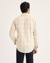 Back view of model wearing Lichen Men's Slim Fit Icon Button Up Shirt.