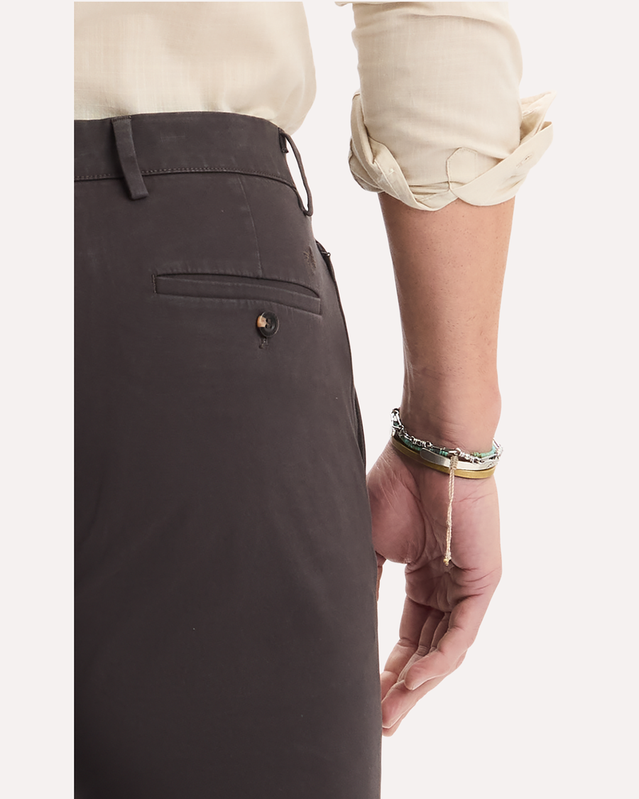 View of model wearing Licorice Crafted Khaki Pants, Slim Fit.