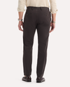 View of model wearing Licorice Crafted Khaki Pants, Slim Tapered Fit.