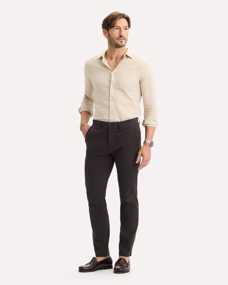 View of model wearing Licorice Crafted Khaki Pants, Slim Tapered Fit.