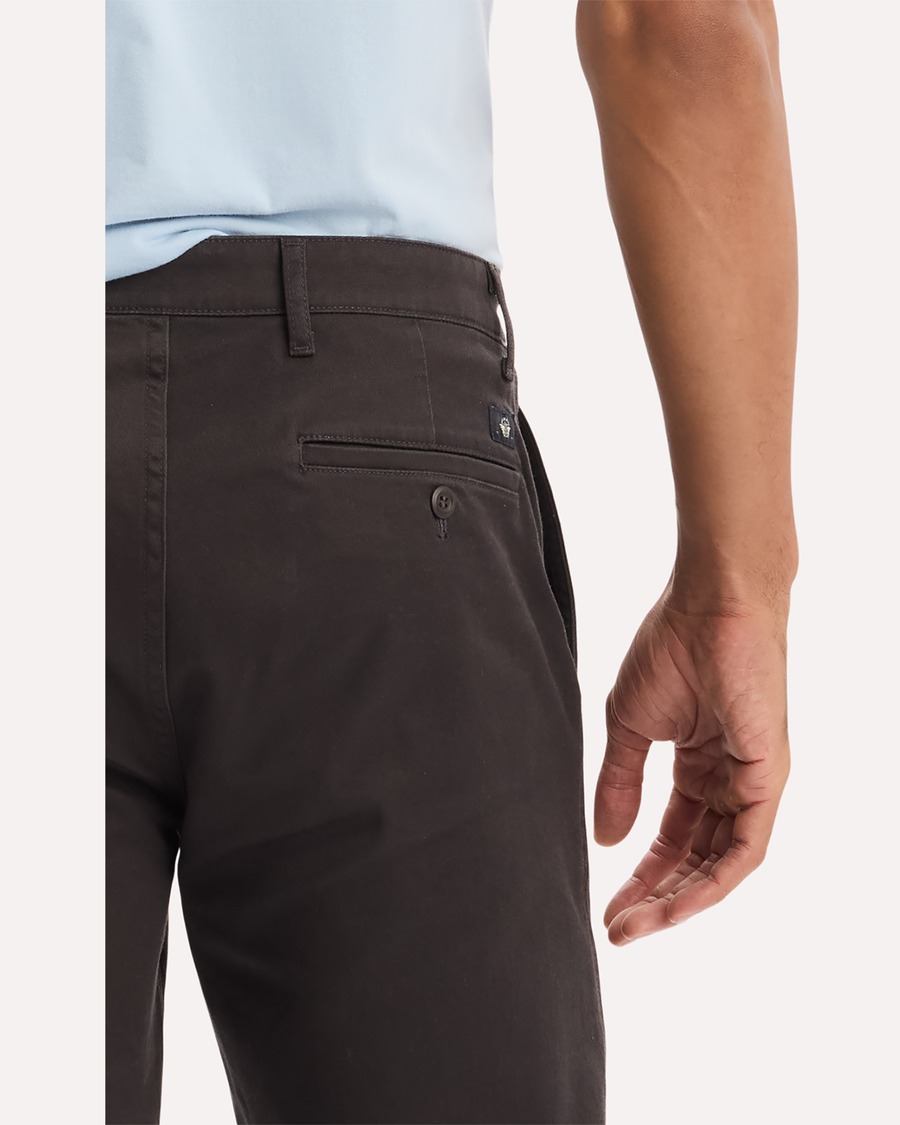 View of model wearing Licorice Original Chino Pants, Slim Fit.