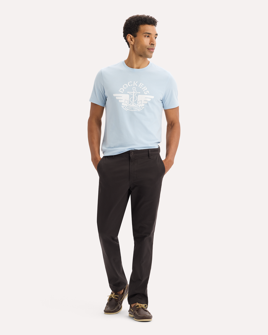 View of model wearing Licorice Original Chino Pants, Slim Fit.
