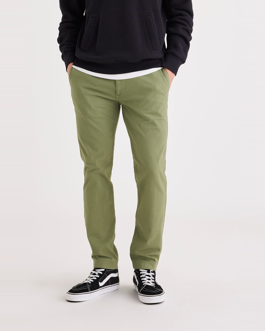 Front view of model wearing Loden Green Alpha Chino Pants, Skinny Fit.