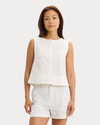 Front view of model wearing Lucent White Button-Front Tank, Regular Fit.