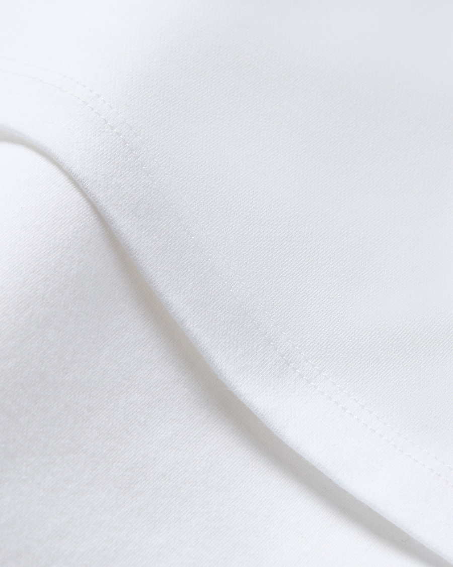 View of model wearing Lucent White Go Tee, Slim Fit.