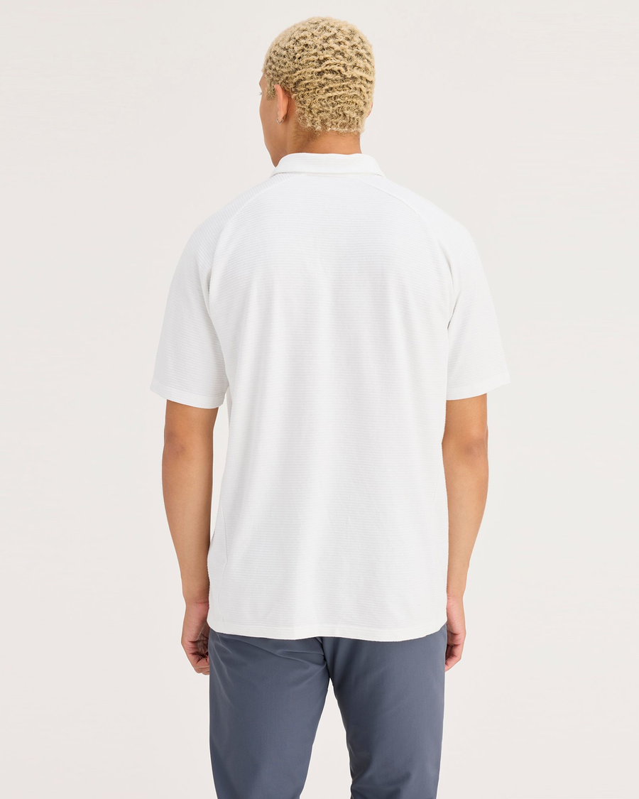 Back view of model wearing Lucent White Men's Regular Fit Go Polo.