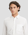 View of model wearing Lucent White Men's Slim Fit Icon Button Up Shirt.