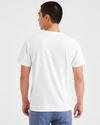 Back view of model wearing Lucent White Men's Slim Fit Logo Tee.