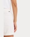 View of model wearing Lucent White Original Chino Shorts.