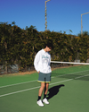 View of model wearing Lucent White Racquet Club Collared Sweatshirt, Relaxed Fit.