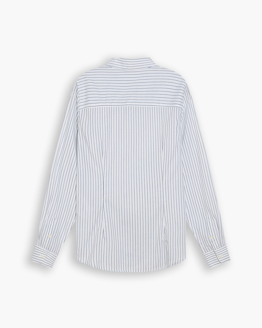 View of model wearing Lucent White Signature Shirt with Stain Defender®, Slim Fit.