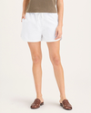 View of model wearing Lucent White Women's Drawstring Shorts.