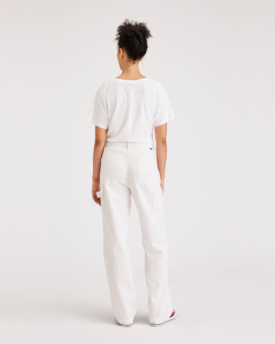 Back view of model wearing Lucent White Women's Straight Fit Carpenter Pants.