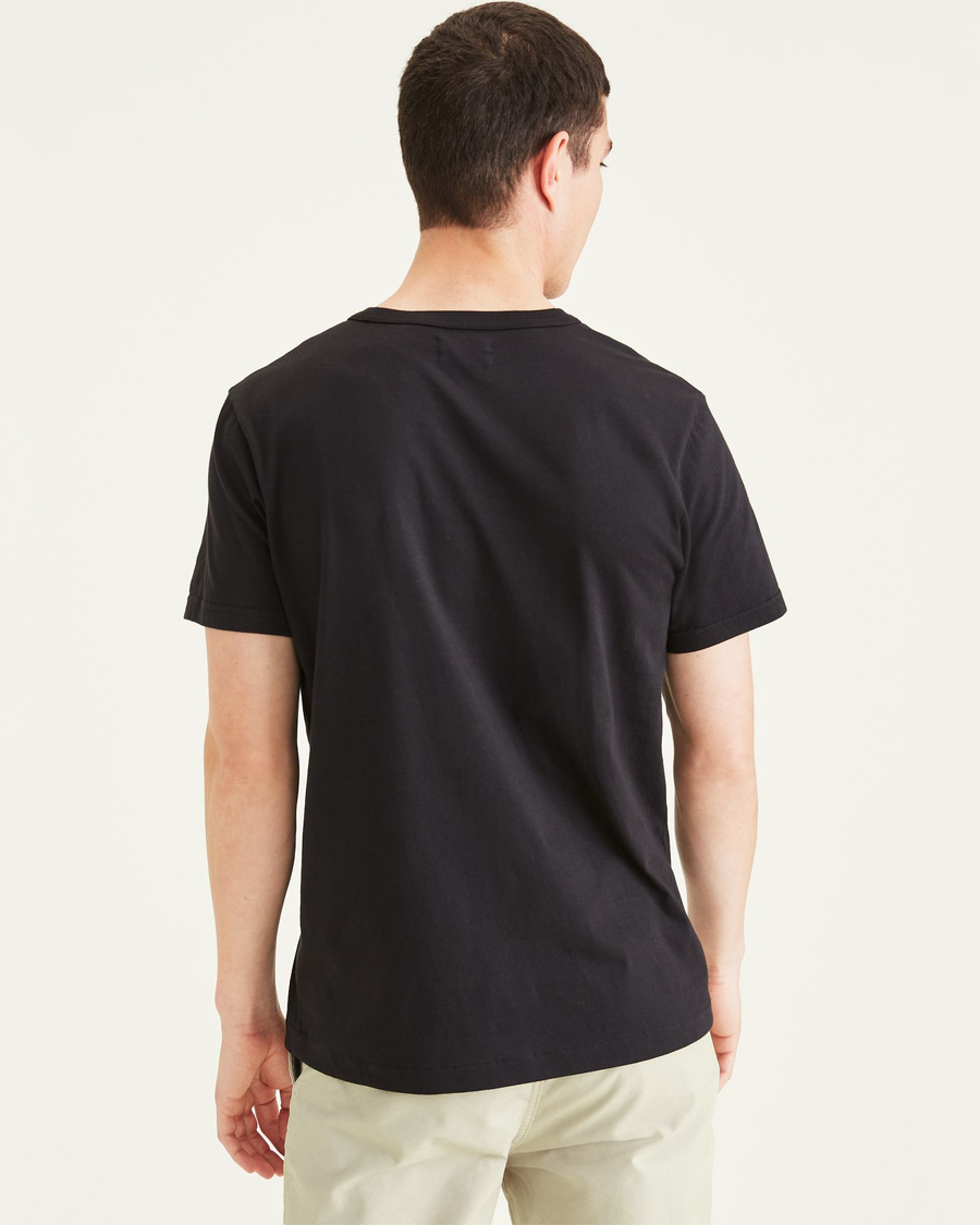 Back view of model wearing Mineral Black Men's Slim Fit Icon Tee Shirt.