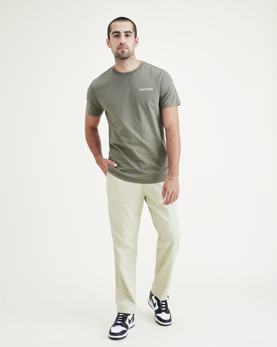 View of model wearing Mottled Green Men's Slim Fit Logo Tee.
