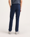 Back view of model wearing Navy Blazer Go Activeflex Chino, Slim Fit.