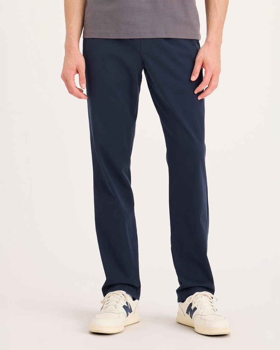 Front view of model wearing Navy Blazer Go Activeflex Pull-On Pant, Slim Fit.