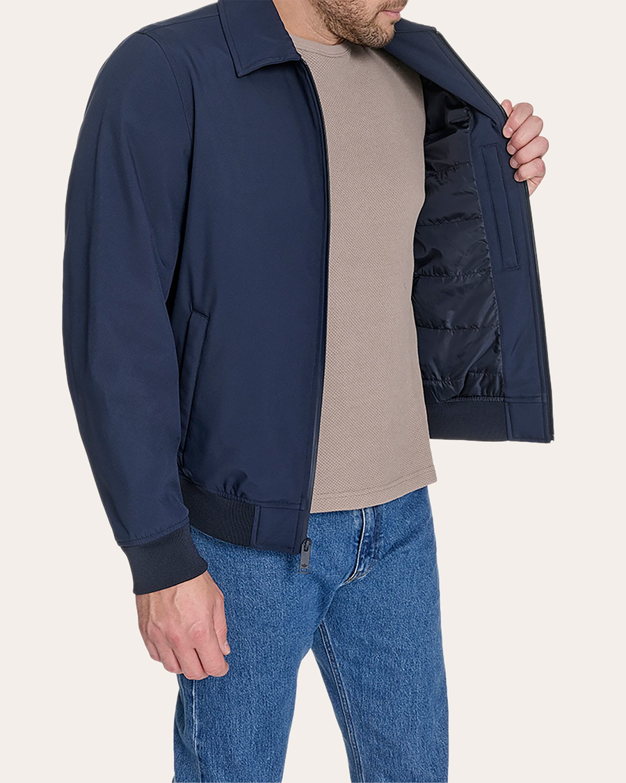 View of model wearing Navy Blazer Go Golf Bomber.