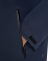 View of model wearing Navy Blazer Go Rain Commuter Jacket.