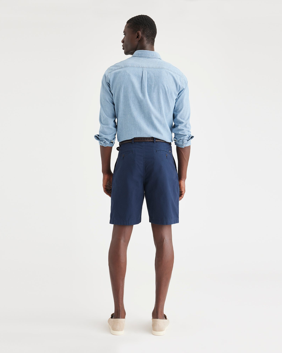 Back view of model wearing Navy Blazer Men's Classic Fit Original Pleated Shorts.