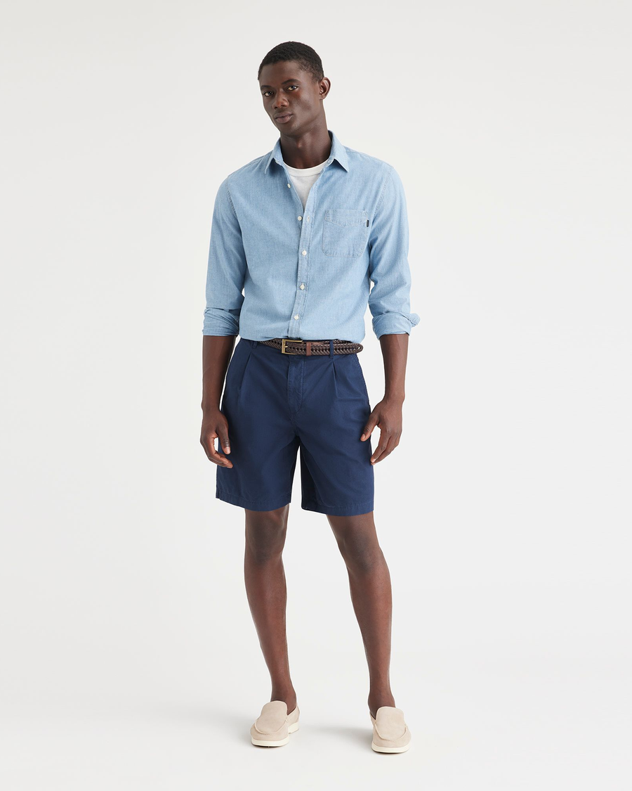 Front view of model wearing Navy Blazer Men's Classic Fit Original Pleated Shorts.